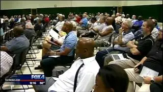 Football coach presents pledge to stop domestic violence to new group