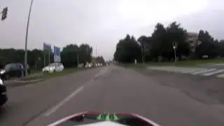 Race between street car and husqvarna sm 125