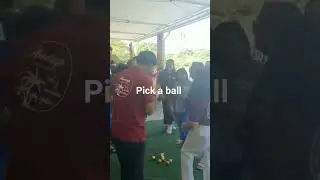 Filipino family reunion game . Pick a ball ! When the music stops , you pick a ball!