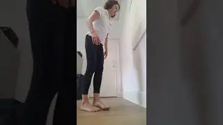 Calf and hamstring stretch against the wall
