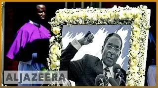 Zimbabwe ex-president Robert Mugabe buried in his native village