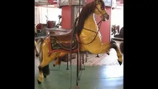 Riding the Flying Horses Carousel in Oak Bluffs, MA on Martha's Vineyard