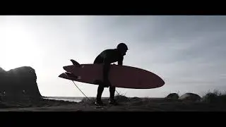 Surfing above the arctic circle. Unstad beach, Lofoten islands.