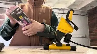 Replacing a bulb in a halogen work light