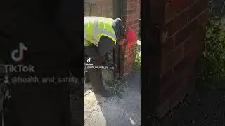 Haringay Today look at this guy using a grinder on a metal Gate Post