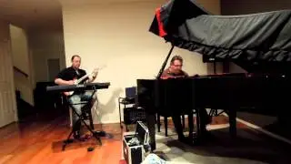 Arcady Glush playing guitar with Eduard Volchek
