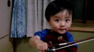 Child plays the violin