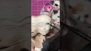 sculpture of nina in black swan