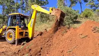 jcb working on digging, loading, dozing and leveling the ground