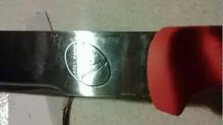 Large Condor Eco Light Machete Cutting Cardboard
