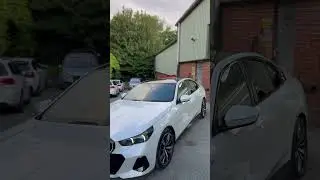 BMW i5 straight out the showroom into the workshop for a gloss black roof wrap #newcars #wrapped