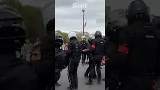 French police simultaneously lift Just Stop Oil eco protesters to shouts of 'bravo'