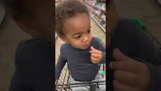 Toddler tries Warheads candy for the first time