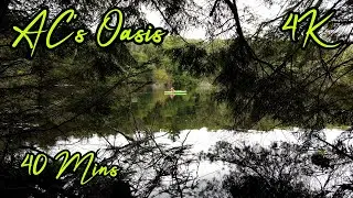 Quiet Mayflower Lake with Kayak Fisherman. Slow TV