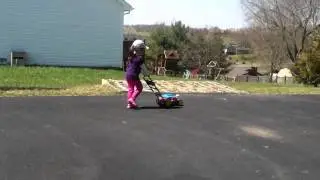 Emma cutting the grass