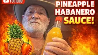 Processing & bottling pineapple habanero hot sauce.
