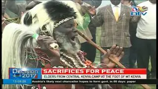 Elders from Central Kenya camp at the foot of Mt. Kenya praying for Kenya