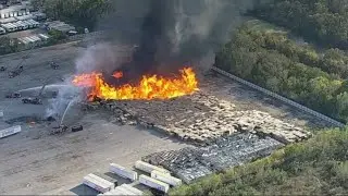 Dallas crews responding to massive 3-alarm pallet fire near Botham Jean. Blvd. and US-175