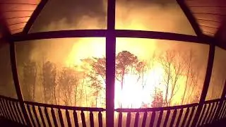 Dramatic CCTV Footage Shows Brushfire Closing in on Tennessee Cabin