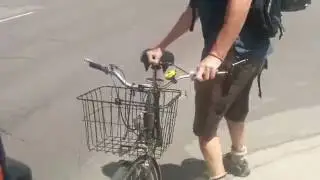 Using front mounted bike rack on city bus in Hamilton, Ontario