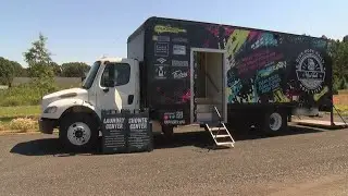 The Giving Pump supporting nonprofit mobile shower and laundry truck in Charlotte