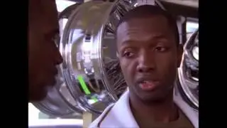 Marlo's bodyguard wearing a bulletproof vest  (The Wire)