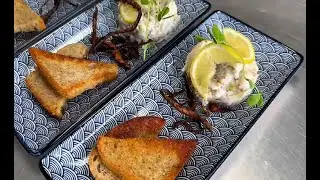 Appetiser: Herring marinated in mustard and yoghurt sauce