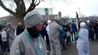 Bryon Mackie carrying the Olympic Torch for the Orangeville Torch Relay