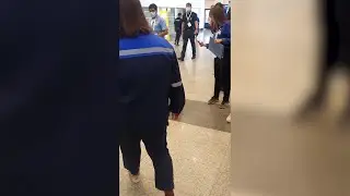 Robot dogs wander around exhibition centre in Thailand