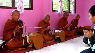 Monks chanting at house blessing in Thailand