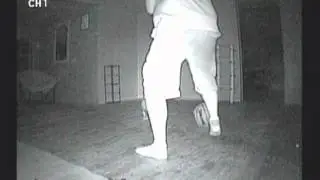 Scared ghost hunter, alone in the dark.