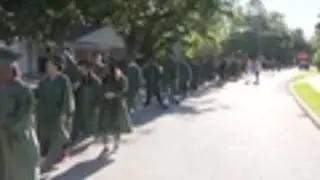 HISD graduates walk to elementary school