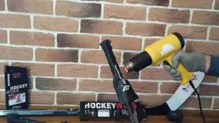 winding the handle of the hockey stick. hockey tape.