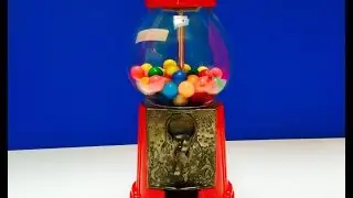 Red Carousel Rainbow Gumball Machine Opening
