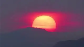 Incredible Letterbox Sunset with Sunspots Visible