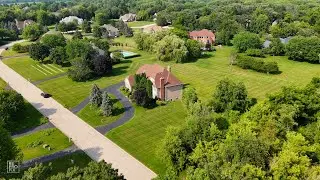 Aerial Tour of 6709 Oakwood Manor Dr &ndash; Crystal Lake Home with Expansive Lot and Private Setting