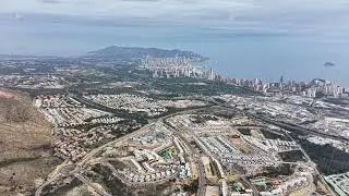 Vivid seaside cityscape with development, Bright coastal area featuring dense buildings and skyline
