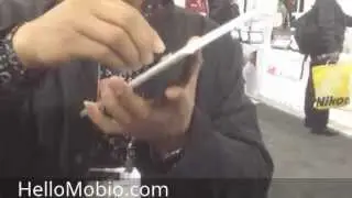 A customer Installing the Mobio Grip on an iPad Mini