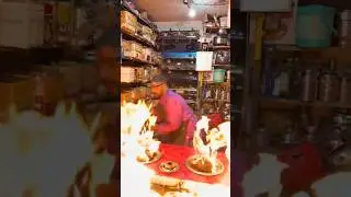 INDIAN REPAIR MAN : repairing gas stove
