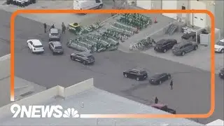 Large police presence reported at warehouse in Adams County