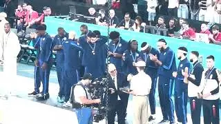 How Joel Embiid reacts with fans who do not like him in the Olympic? Answer in the ceremony