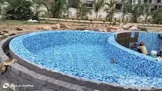 glass mosaic tile work swimming pool in progress