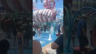 Girls playing in Super Silly Funland getting drenched