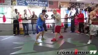 Zou Shiming works mitts with Freddie Roach