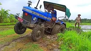 Sonalika DI 745 III stuck with rotavator in mud