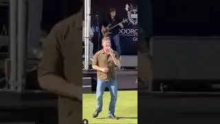 Lachy and Anthony preforming at a Golf club