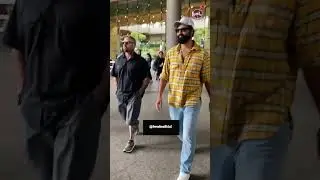 vicky Kaushal poses with fans at the airport as he lands back in the city