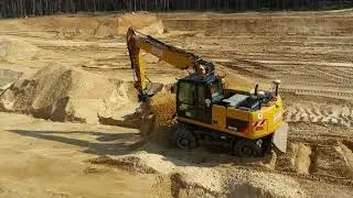 CAT M315D with Trimble Dual GPS doing the batter