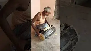 my old villager playing 'dholk'.A oldest drum instrumant of India.
