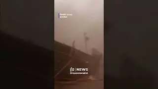 🌪️ Storm rips off roof, misses pedestrian by inches! 😱